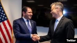 Սուրեն Պապիկյանը և Քոլին Քահլը, արխիվ