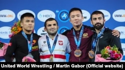 Эркин күрөш боюнча Дүйнө чемпионатынын 70 килограмм салмактагы байге ээлери. 5-октябрь, 2021-ж. Осло, Норвегия.