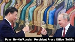 Сӣ Ҷинпин, раҳбари Чин ва Владимир Путин, раиси ҷумҳури Русия. Маскав, моҳи марти 20223