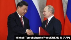 Си Дзинпин и Владимир Путин в Москва