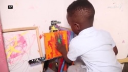  يوه افريقايي ماشوم د کم عمره انځورګر نړيوال ريکارډ جوړ کړی