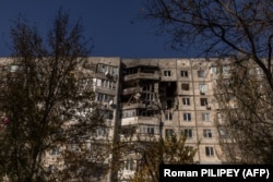 Bloc de apartamente grav avariat în timpul atacurilor rusești din orașul Herson, situat în sudul țării, 29 octombrie.