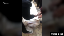 Согуштан келген темир табыт.