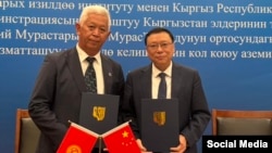 Кыяс Молдокасымов менен Бу Сиянчун.