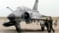 French pilots stand next to a Mirage-2000N fighter jet. (file photo)