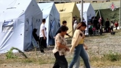 Ethnic Armenians Converge On Airport As 'Reintegration' Talks Held In Nagorno-Karabakh