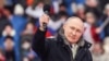 Владимир Путин в Лужники по време на митинг-концерт, посветен на Деня на защитника на Отечеството - 22 февруари.