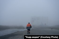 Работник "Берингпромугля" в куртке Tigers Realm Coal. Фото: Марина Сычева