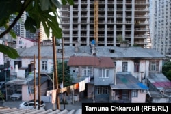 The MJM Panorama hotel towers above the old district.