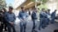 Armenia - Riot police stand outside a court in Yerevan during a hearing on businessman Samvel Karapetian's arrest, October 15, 2025.