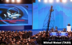 Putin used massive video screens to show off Russia's new "strategic weapons," almost all of which he suggested were nuclear-capable.