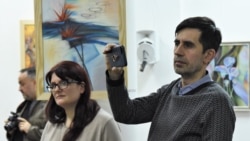 Jurnalista Lina Grâu și scriitorul Iulian Ciocan