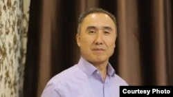 Айданбек Акматов.