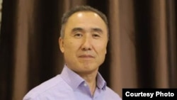 Айданбек Акматов.