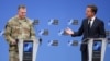 NATO chief Mark Rutte (right) holds a joint news conference with US General Alexus Grynkewich, NATO's supreme allied commander Europe.