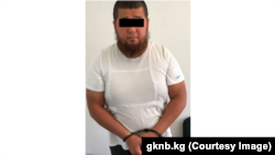 Чынгыз Жумагулов после задержания. Фото ГКНБ.