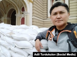 Адил Турдукулов.