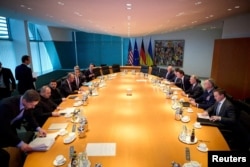 Канцлер Фрідріх Мерц приймає українську та американську переговорні делегації в Берліні, Німеччина, 14 грудня 2025 року