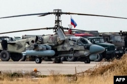 Российская военная техника на авиабазе Камышлы на северо-востоке Сирии. 12 декабря 2024 года, спустя 4 дня после падения режима Башара Асада