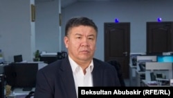 Алмамбет Шыкмаматов.