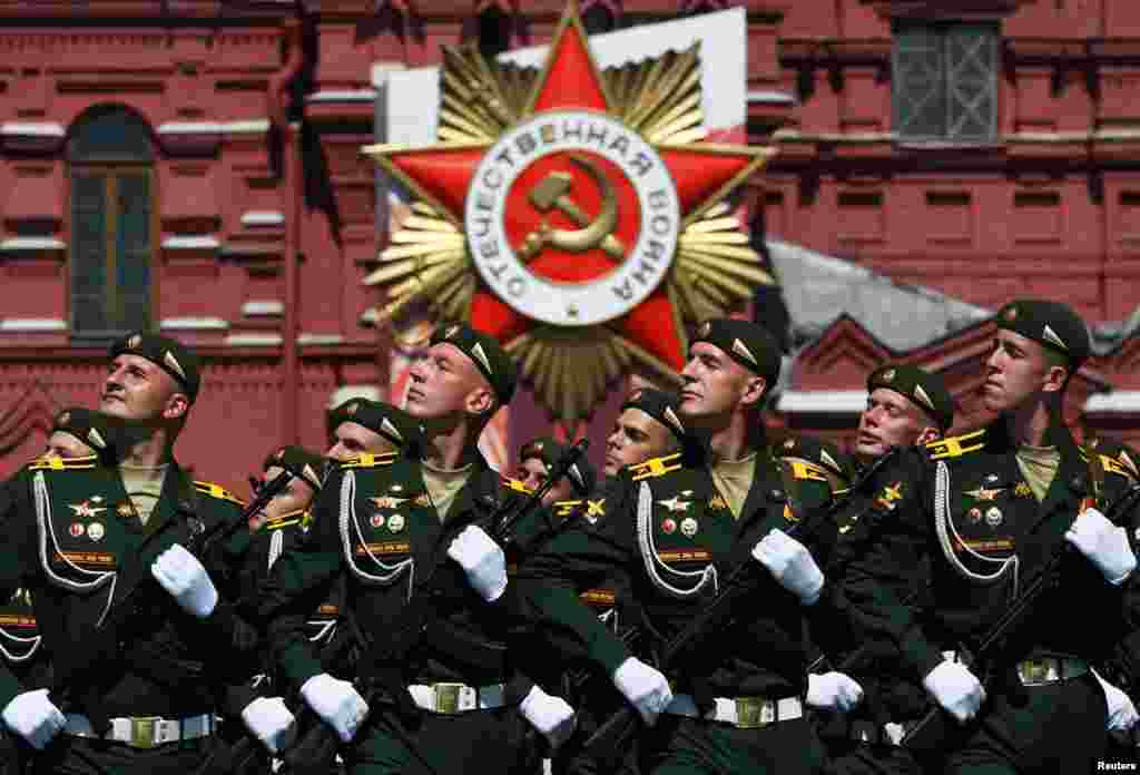 Russian servicemen march during the Victory Day parade in Moscow's Red Square on June 24. The military parade, marking the 75th anniversary of the victory over Nazi Germany in World War II, was scheduled for May 9 but postponed due to the outbreak of the coronavirus.