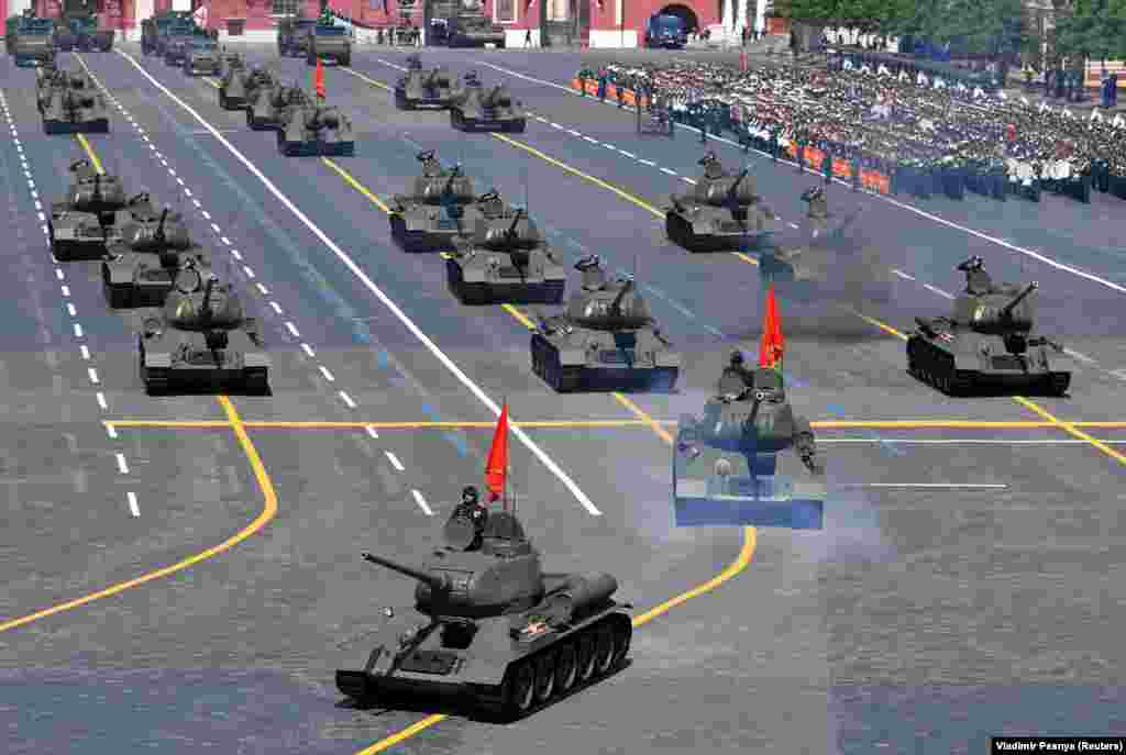 T-34 Soviet-era tanks drive during the Victory Day Parade on Red Square in Moscow.&nbsp;The event showcased more than 200 historic and modern military vehicles.