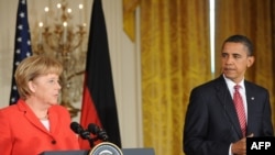 U.S President Barack Obama and German Chancellor Angela Merkel at a White House news conference.