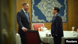 Държавният секретар на САЩ Марко Рубио (вдясно) разговаря с ръководителя на президентската канцелария на Украйна Андрий Йермак по време на срещата в Джеда, Саудитска Арабия, 11 март 2025 г.