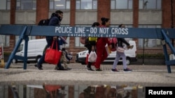 Мигранты из Колумбии в Чикаго (США), 25 октября 2023 г.
