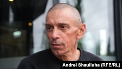 Ihar Karnei în Lituania, în iunie 2025, după ce a fost eliberat din închisoarea din Belarus, împreună cu alți 13 deținuți politici ai regimului Lukașenko, în cadrul unui schimb mediat de SUA