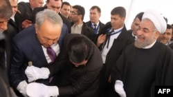 Казак, түркмөн, иран президенттери темир жолду ачуу салтанаты учурунда. 3-декабрь, 2014-жыл