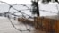 Ukraine, Crimea - Barbed wire on the background of the sea, 22Mar2016