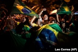 Сторонники Жаира Болсонару празднуют победу. Рио-де-Жанейро, 28 октября