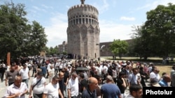 Armenia - Armenian opposition supporters join a religious festival in Echmiadzin, June 22, 2025.