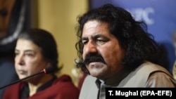 Ali Wazir (right), a member of parliament from the North Waziristan tribal district, was arrested last December on sedition charges.