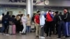 Мигранты из Кыргызстана в аэропорту в России