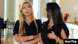 Azerbaijani President Ilham Aliyev's daughters, Arzu and Leyla, at Park Bulvar in Baku in June 2010.