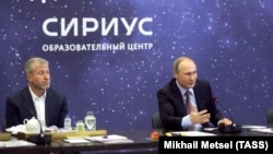 ვლადიმირ პუტინი და რომან აბრამოვიჩი