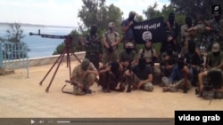 Акси силоҳбадастони тоҷике, ки мегӯянд, дар Сурияанд