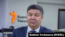 Алмамбет Шыкмаматов.