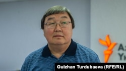 Зайнидин Курманов.