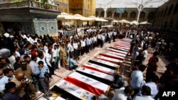 "ИМ" тобунун жанкечтилери жасаган жардыруу курмандыктарын акыркы сапарга узатуу. Нажаф, 2-июнь, 2015-жыл.