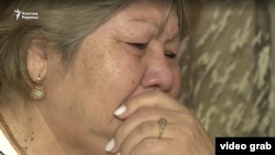 Айгуль Капсаланова, мать погибшего во время Январских событий Ауеза Капсаланова. Скриншот кадра видеозаписи