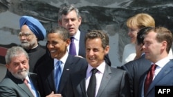 Indian Prime Minister Manmohan Singh (left) with other world leaders at a G8 summit in July.