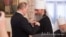 Очільник Росії Володимир Путін нагороджує митрополита УПЦ (МП) Онуфрія (Березовського) державною нагородою РФ – орденом Дружби. Київ, Києво-Печерська лавра, 27 липня 2013 року