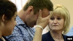 Russian opposition figure Aleksei Navalny reacts as the judge reads his sentence in the Kirov courtroom on July 18.