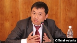 Санжар Кадыралиев.