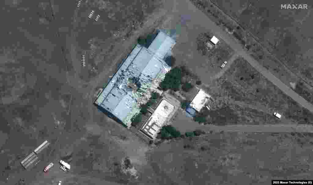 Пашкоджаны будынак на вайсковай базе Бід-Канэ