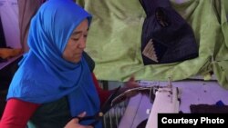 Жыпариза Топчубек кызы.