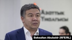 Алмамбет Шыкмаматов.